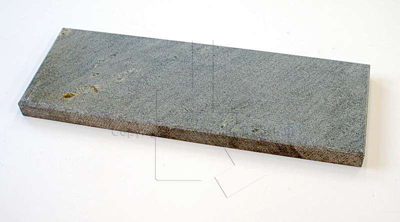 Handöl 9 Speckstein mittig vor der Brennkammer