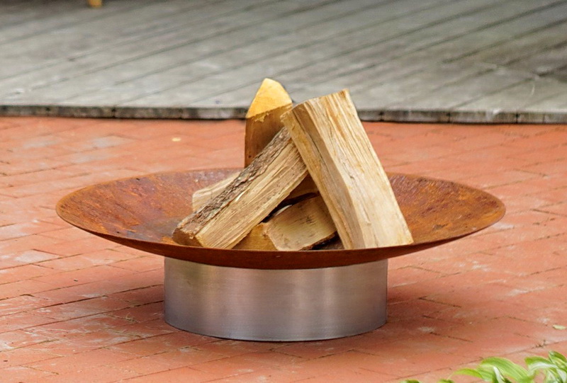Feuerstelle Gedi ø 80 x 20 cm aus Rohstahl rostemd mit Fuß aus Edelstahl mit Holz